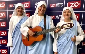 Las hermanas Hellen Michelle, María Alejandra y Ana María, Comunicadoras Eucarísticas.