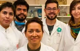 Científica Eva Ramón Gallegos, con varios colaboradores.