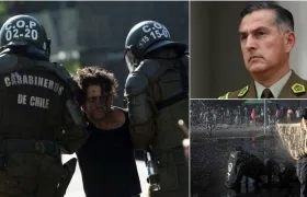 Carabineros detienen hoy a un manifestante durante una protesta junto al Palacio de La Moneda, en Santiago (Chile).