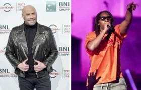 El actor John Travolta y el rapero Lil Jon.