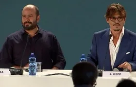 El cineasta colombiano Ciro Guerra y el actor estadounidense Johnny Depp.