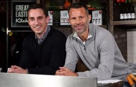 Los exfutbolistas Gary Neville y Ryan Giggs.