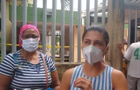 La empleada Carmen y la médico Dalila Peñaranda.
