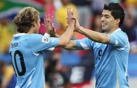 Diego Forlan y Luis Suárez. 