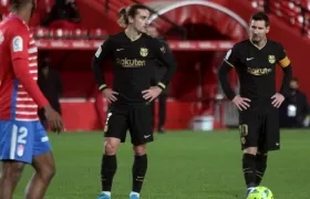 Lionel Messi y Antoine Griezmann. 