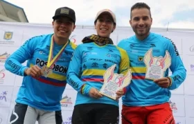 Carlos Mario Arboleda, Mariana Pajón y Carlos Ramírez. 