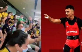 Los atletas mientras veían la participación de Luis Javier Mosquera. 