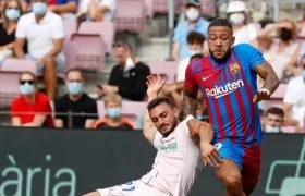 Memphis Depay en acción de partido. 