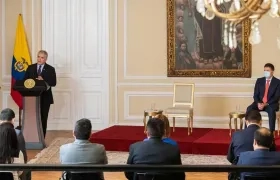 El presidente Iván Duque y el ministro de Justicia, Wilson Ruiz.