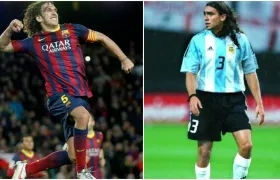 Carles Puyol y Juan Pablo Sorín. 