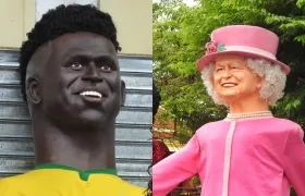 Muñecos gigantes de 'O Rei' Pelé y la reina Isabel II.