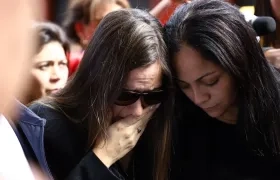 La periodista paraguaya Claudia Aguilera (izquierda).