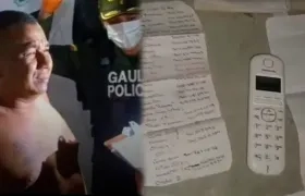 'Negro Ober' y el teléfono fijo con la lista de víctimas de extorsión.