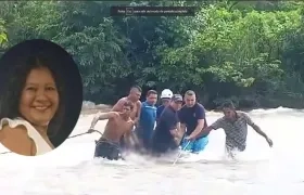 María López en momentos en que era rescatada del río Guatapurí
