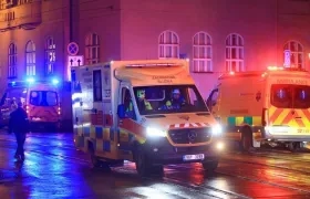 Autoridades en el lugar donde ocurrió la masacre. 