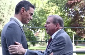 Pedro Sánchez y Edmundo González.