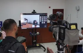 La prensa en la sala alterna de la audiencia preparatoria de juicio.