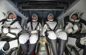 Los astronautas antes de llegar a la tierra. 