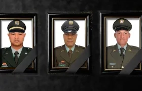 Tres de los cuatro policías asesinados este fin de semana. 