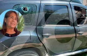 Lissi Judith Camargo Noriega y la camioneta baleada.