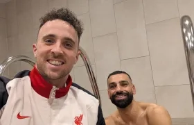 Diogo Jota y Mohamed Salah.