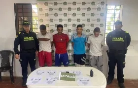 Los cuatro capturados por la Policía.