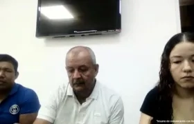 Los tres imputados durante las audiencias preliminares. 