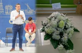 Mauricio Lizcano y la corona fúnebre que llegó a su sede en Manizales.