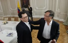 El precandidato Carlos Caicedo y el Presidente Gustavo Petro.