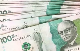 Billetes de 100 mil pesos. 