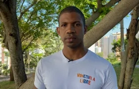 Juan Carlos Viloria, vicepresidente de 'Venezolanos en Barranquilla', y Nicolás Maduro, Presidente de Venezuela.