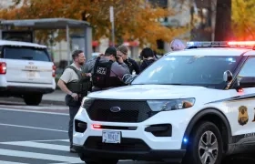 Agentes custodian cerca de la Casa Blanca en Washington 