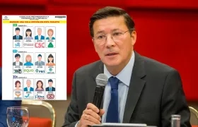 La tarjeta electoral y el registrador Hernán Penagos.