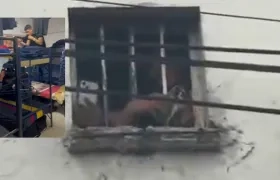 Los auxiliares del Inpec y las dos personas que grababan el desfile.