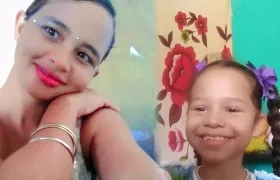 Andrea Carolina González Silvera con su hija Zoe. 