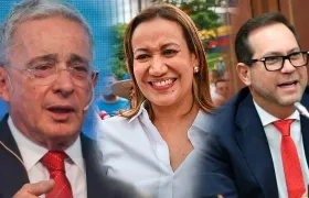 Álvaro Uribe Vélez, Carolina Corcho y Lidio García.