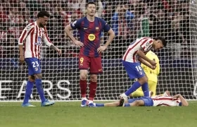 Jugadores del Atlético de Madrid celebran tras eliminar al Barcelona. 