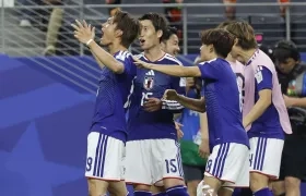 Jugadores de Japón celebrando su empate ante Países Bajos.