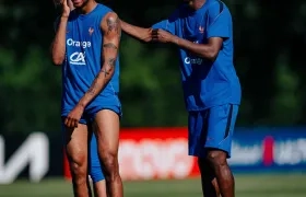 Michael Olise y Ousmane Dembélé.