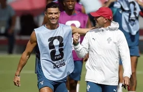 Cristiano Ronaldo y Roberto Martínez, entrenador de Portugal.