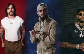 Los artistas Juanes, Yandel y Anuel AA.