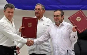 Expresidente Juan Manuel Santos y Rodrigo Londoño.