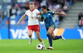 La colombiana Maithe López avanza ante la marca de Magda Piekarska.