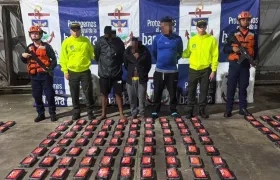 La droga incautada y los capturados.