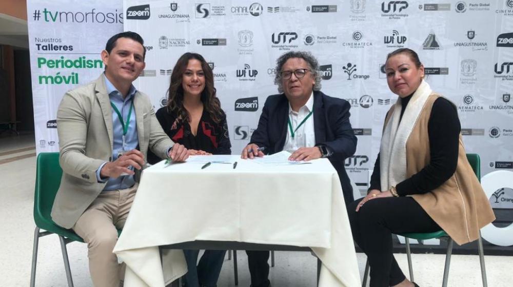 Firma del convenio entre la Cinemateca Nacional de Nicaragua y Canal ZOOM de Colombia.