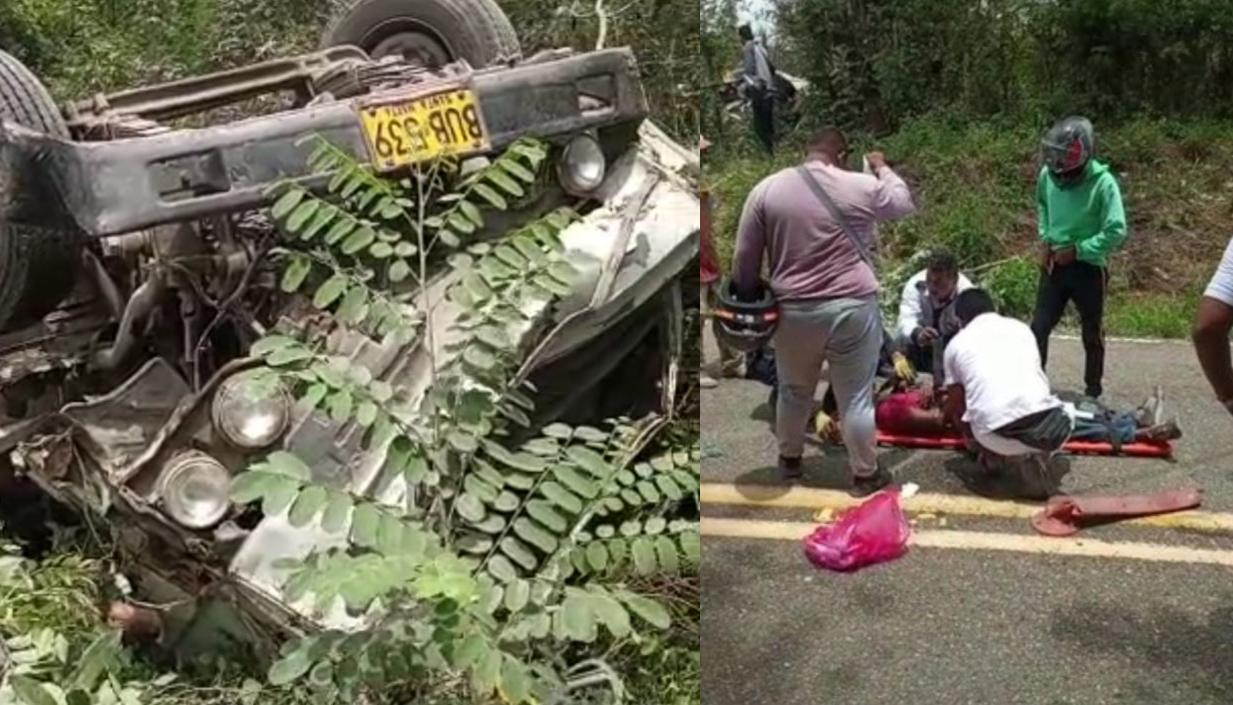 Camión que cayó al abismo y el herido cuando era auxiliado. 