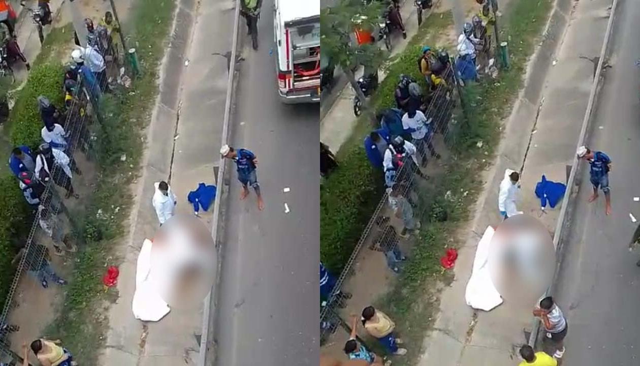 Momento en que la Policía realizaba la inspección del cuerpo del joven. 