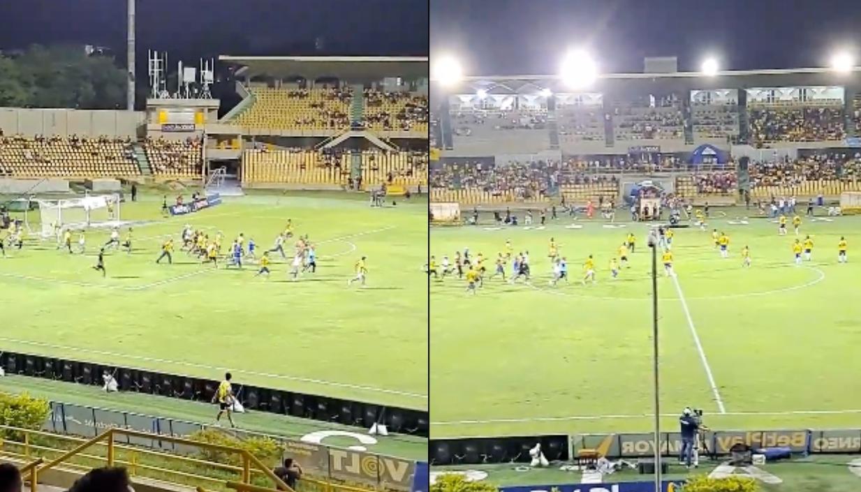 Hinchas invadiendo el terreno de juego del Jaime Morón. 