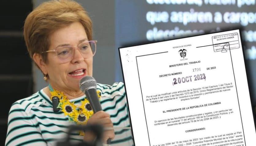 La ministra de Trabajo, Gloria Ramírez, enseña el decreto 1736 del 20 de octubre