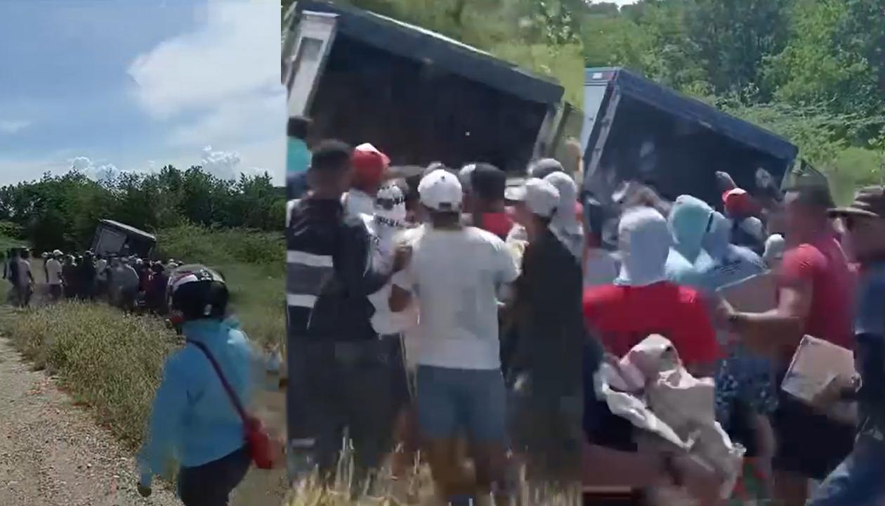Momento en el que el camión es saqueado por varios habitantes.